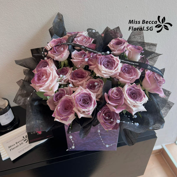 Dark purple rose basket table flower