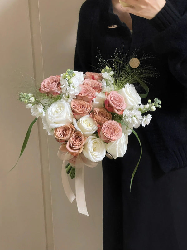 ROM cappuccino with white rose bridal bouquet